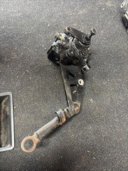 1985 HONDA ATC 350X REAR BRAKE CALIPER And TORQUE LINK And BRACKET