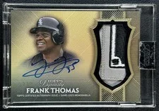 This is a picture showing FRANK THOMAS 2017 TOPPS DYNASTY #AP-FT2 GAME-USED PATCH AUTO GOLD 5/5 WHITE SOX