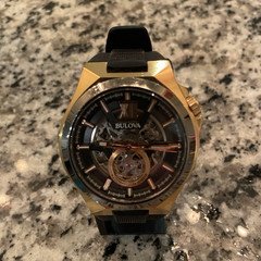 Bulova Sutton Skeleton Dial Automatic Men's Watch Black Rubber Strap Gold Case