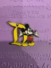 This is a picture showing Disney Hidden Mickey Disneyland D Mickey Mouse Pin 2019
