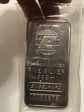 This is a picture showing Engelhard 10 oz Silver Bar In Plastic 999+ Vintage