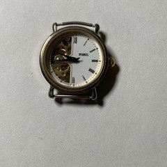 Fossil Mechanical Skeleton Dial Roman Numerals Gold and Silver Watch