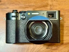 This is a picture showing Fujifilm X100VI Black Exc. Condition, Loaded Accessory Bundle, Low Shutter Count