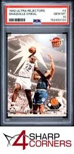 This is a picture showing 1992 ULTRA REJECTORS #4 SHAQUILLE O'NEAL RC MAGIC HOF PSA 10