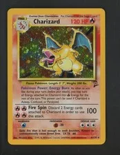 This is a picture showing Pokemon TCG Base Set 2 #4/130 Charizard Holo Rare SWIRL