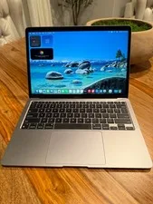 This is a picture showing Apple MacBook Air M1 2020 13.3" 8GB RAM 256GB SSD Space Gray - 24 Cycles MINT