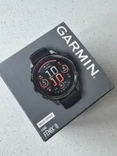 This is a picture showing BRAND NEW in BOX (Unopened): Garmin Fenix 8 Pro AMOLED Sapphire Smartwatch 47 mm