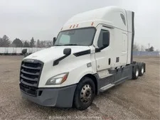 This is a picture showing 2023 Freightliner Cascadia T/A Sleeper Truck Tractor Detroit DD15 A/T bidadoo