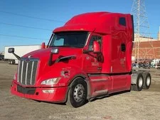 This is a picture showing 2023 Peterbilt 579 T/A High Roof Sleeper Truck Tractor Cummins X15 A/T bidadoo