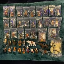 This is a picture showing LEGO The Hobbit Retired Bulk Lot - 14 Complete Sets 55 Minifigs w All 13 Dwarves