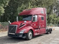 This is a picture showing 2023 Volvo VNL860 T/A High Roof Sleeper Cab Truck Tractor D13N-500 A/T bidadoo