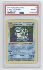 This is a picture showing BLASTOISE 1999 POKEMON BASE SET 1ST EDITION SHADOWLESS HOLO 2/102 PSA 8 Q0593
