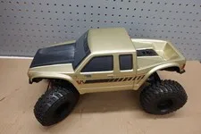 This is a picture showing Axial RC AXI-3071 1/10 SCX10 III Coyote 4X4 RTR Rock Crawler (Truck only)