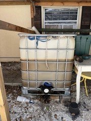 IBC Tote Tank Intermediate Bulk Container on Pallet w/ Metal Cage & Bottom Valve