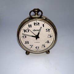 Ingersoll table clock features a gold-tone brass case 2 Jewels  3” Tall
