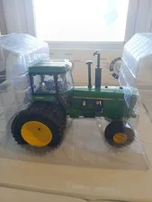 This is a picture showing 1/16 Ertl John Deere 4840 Custom Precision Elite Series. NO RESERVE AUCTION 