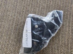 M171148: Buckle Left Side Rear Bracket/ Bin 003