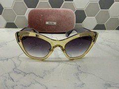Miu Miu SMU 11P TIM 4W1 Sunglasses Transparent Yellow Frame Dark Violet lenses
