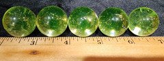 One Vintage Vaseline Glass Uranium Marble Glows! approx 1 inch. 74 available.
