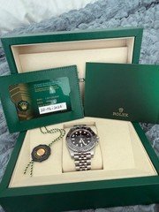 Rolex GMT Master II Bruce Wayne Jubilee 2025 - 126710GRNR Complete with Papers