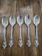 This is a picture showing Lot Of 5 Sterling Silver Lunt Eloquence Teaspoon Flatware 182.5 Grams