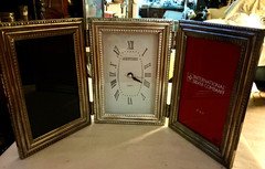 triple 2 photos also has battery operated clock in working order picture frame