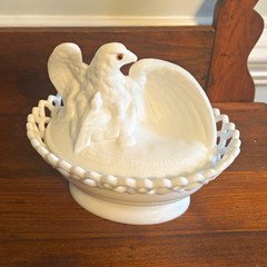 Vintage Westmoreland milk glass eagle on a nest with amber eyes